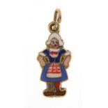 Unmarked gold and enamel Dutch girl charm, 1.5cm high, 0.4g