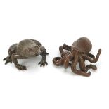 Two large Japanese patinated bronze animals comprising octopus and frog, each with impressed