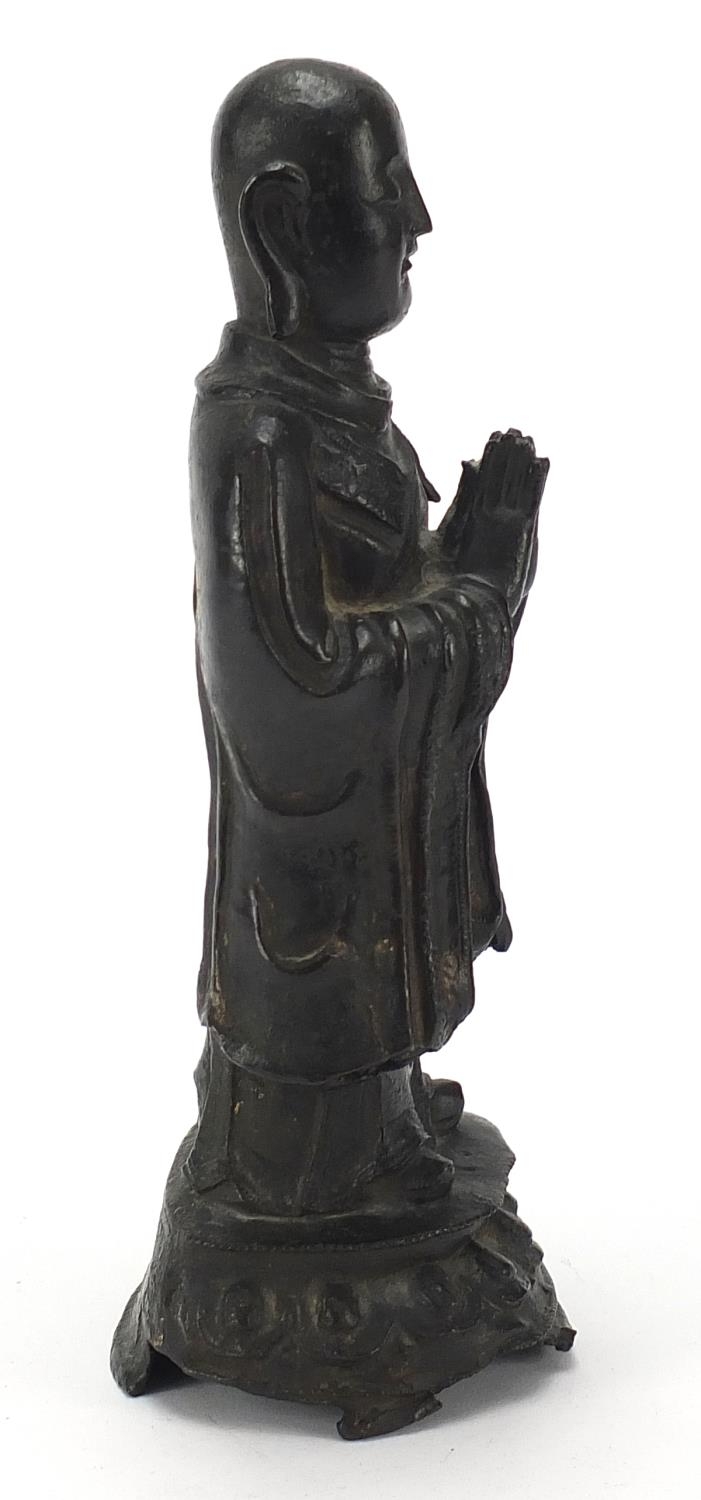 Chinese patinated bronze figure of a standing monk, 24.5cm high - Image 5 of 7