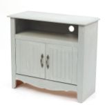 Painted wood multi media stand with open shelf above pair of cupboard doors, 71cm H x 78cm W x