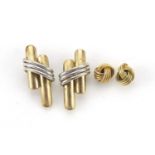 Two pairs of 9ct gold stud earrings, the largest 1.5cm high, total 1.6g