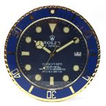 Rolex design Submariner dealer's display wall clock with blue dial, 35cm in diameter