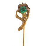Gold coloured metal naturalistic stick pin set with a green stone, 8cm in length, 3.6g