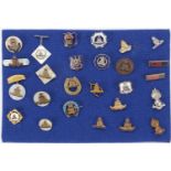 Twenty six British military Royal Artillery badges and bars, including enamel and silver examples