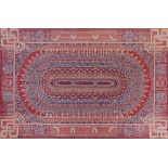Turkish rug decorated with flowers and roundels, 200cm x 124cm