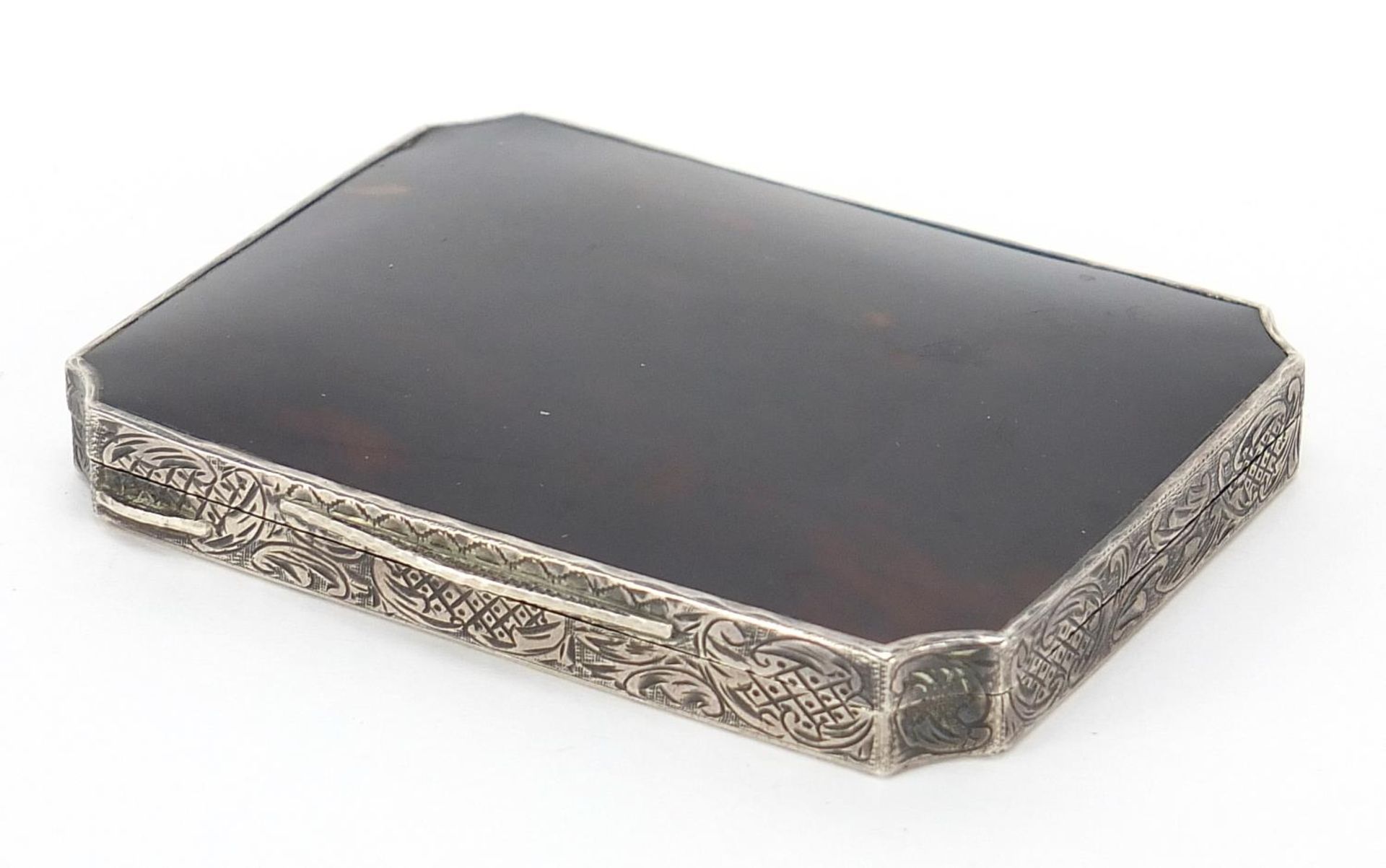 Continental silver and tortoiseshell box with hinged lid and engraved decoration, indistinct