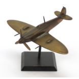 Military interest metal model Spitfire on stand, 11cm high
