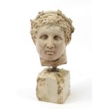 Roman style bust of a man, raised on a stone style base, 51.5cm high