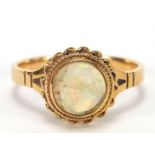 18ct gold cabochon opal ring with ornate setting, size L, 3.1g