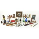 Sundry items to include a Strathearn paperweight, leaded glass panel, Mozart bust and figurines, the
