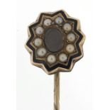 Antique unmarked gold and enamel mourning stick pin set with seed pearls, housed in a Curive Saria