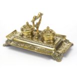 Victorian ornate brass double ink stand, 27cm wide