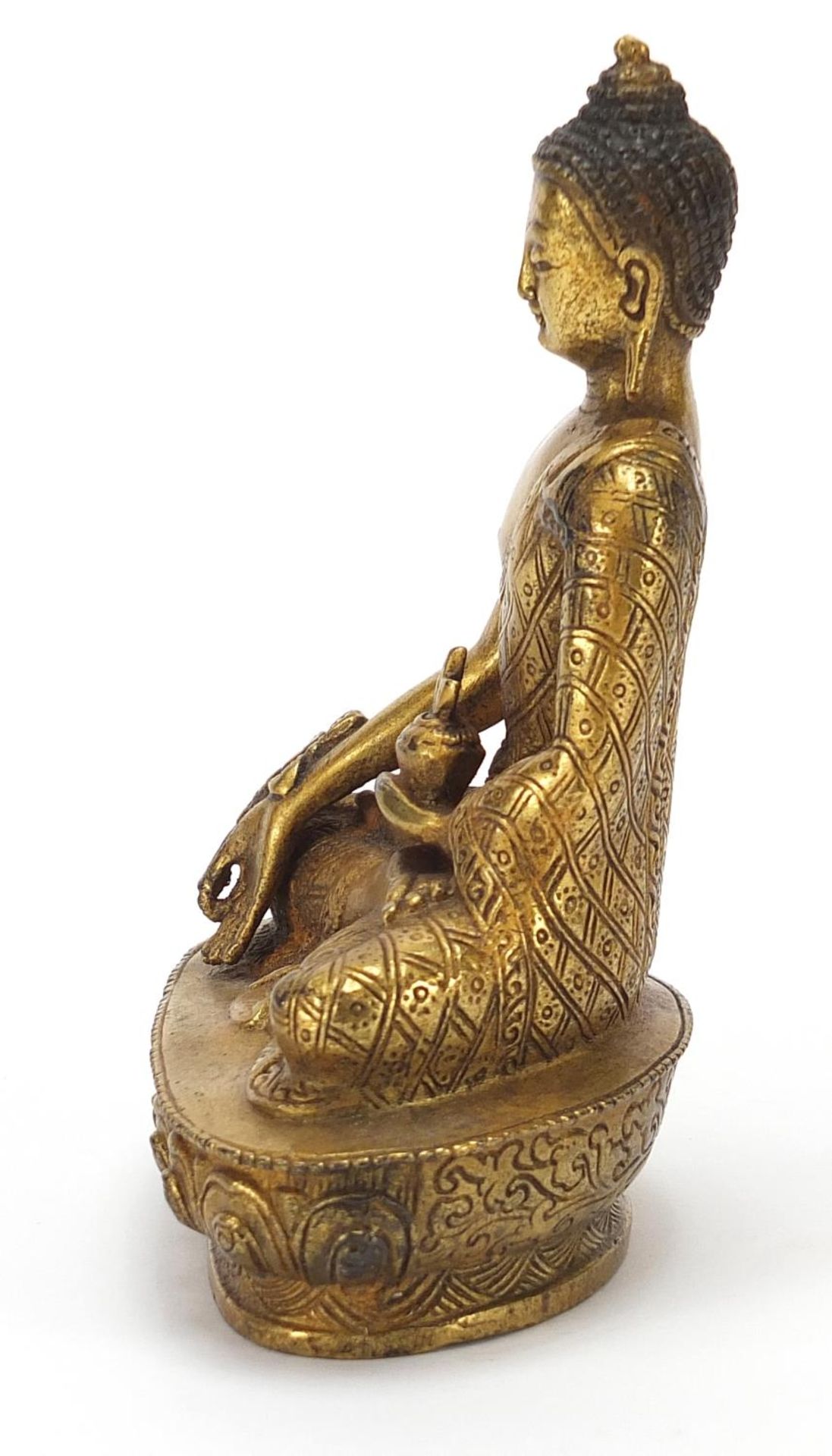 Chino Tibetan gilt bronze figure of seated buddha, 13cm high - Image 3 of 8