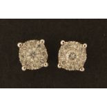 Pair of 9ct white gold diamond stud earrings, 4.2mm in diameter, 1.0g