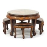 Chinese carved wood nest of tables with glass top, the largest 53cm H x 73cm in diameter