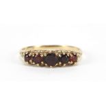 9ct gold graduated garnet five stone ring, size N, 1.6g