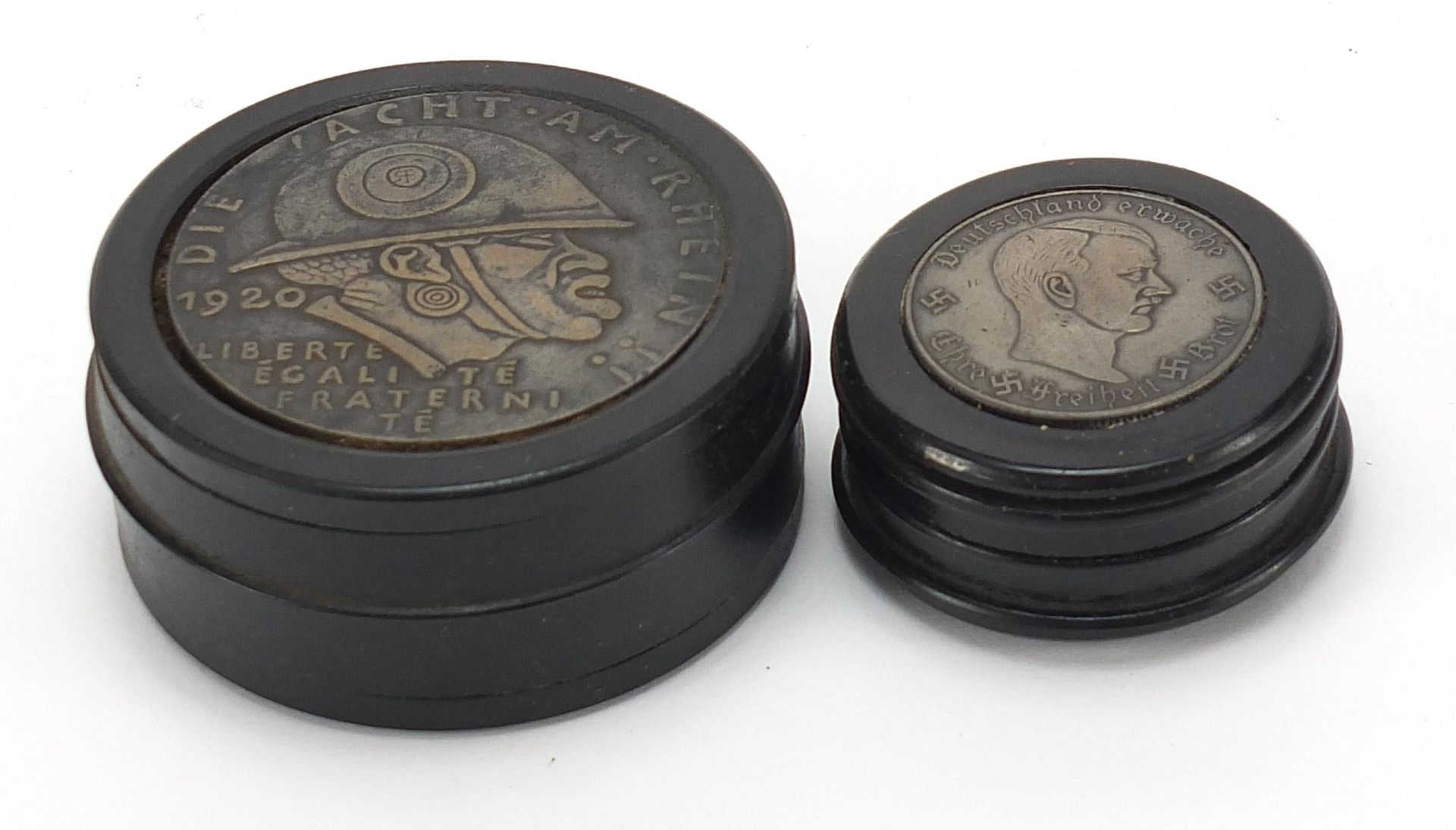 Two German military interest snuff boxes, 6.5cm and 5cm in diameter