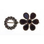 Two antique unmarked gold brooches comprising garnet flower head and diamond wreath, 2.2cm and 1.5cm