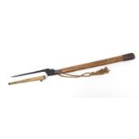 Military interest short bayonet with sheath fitted to a wooden handle, 69cm in length