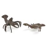 Two Japanese patinated bronze animals comprising crayfish and lobster, each with impressed marks,