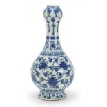 Chinese blue and white porcelain garlic head vase hand painted with flower heads amongst scrolling