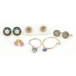 Five pairs of earrings including some 9ct gold, the gold examples 0.8g