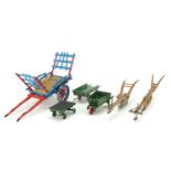 Scratch built metal and wood models of carts, wheelbarrows and ploughing implements, the largest