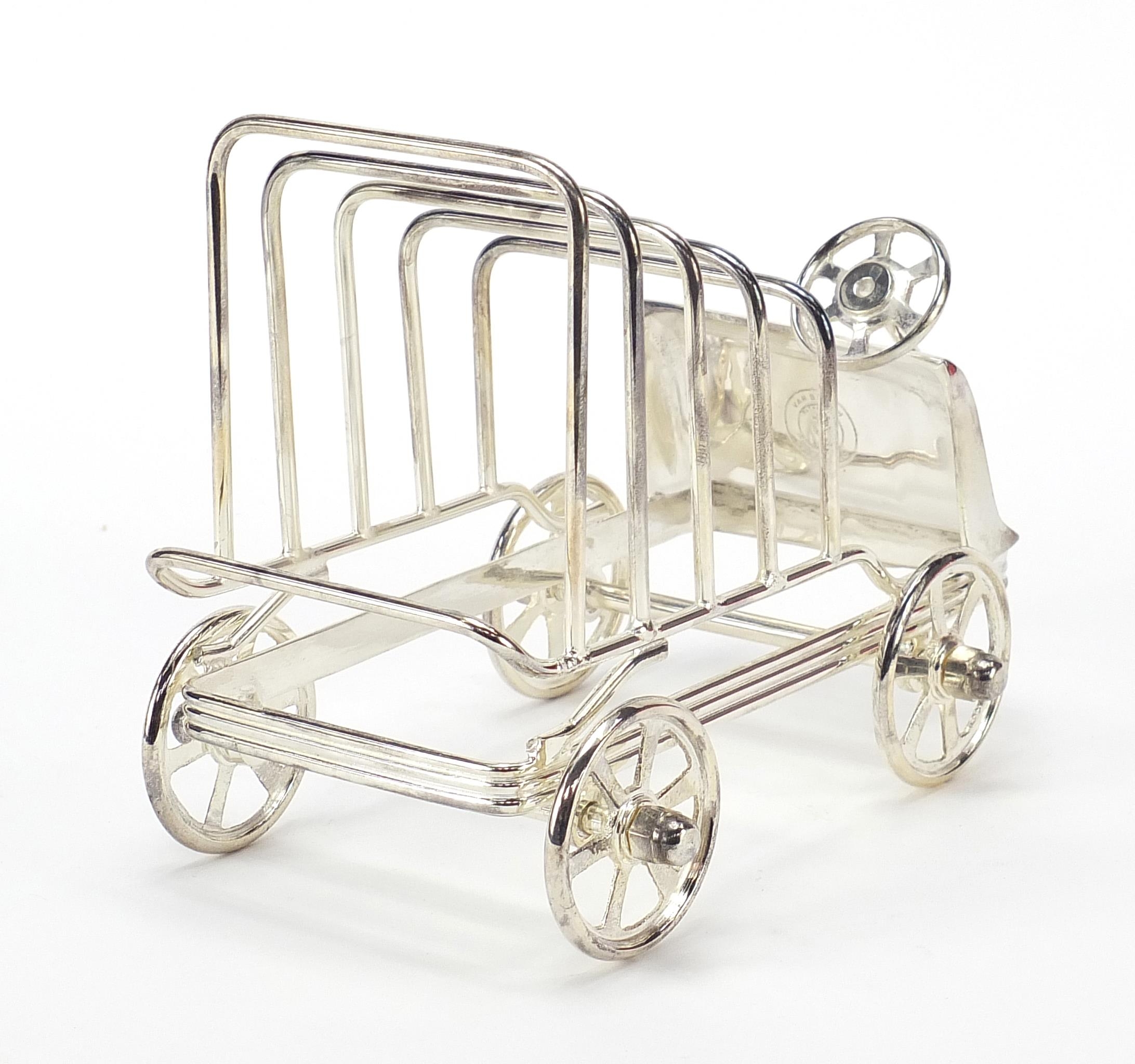 Novelty silver plated five slice toast rack in the form of a car with rotating wheels, 15.5cm in - Image 2 of 4