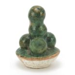 Chinese pottery fruit having a green glaze, 7.5cm high