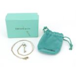 Tiffany & Co, silver key pendant on necklace, 46cm in length, with box, 3.8g