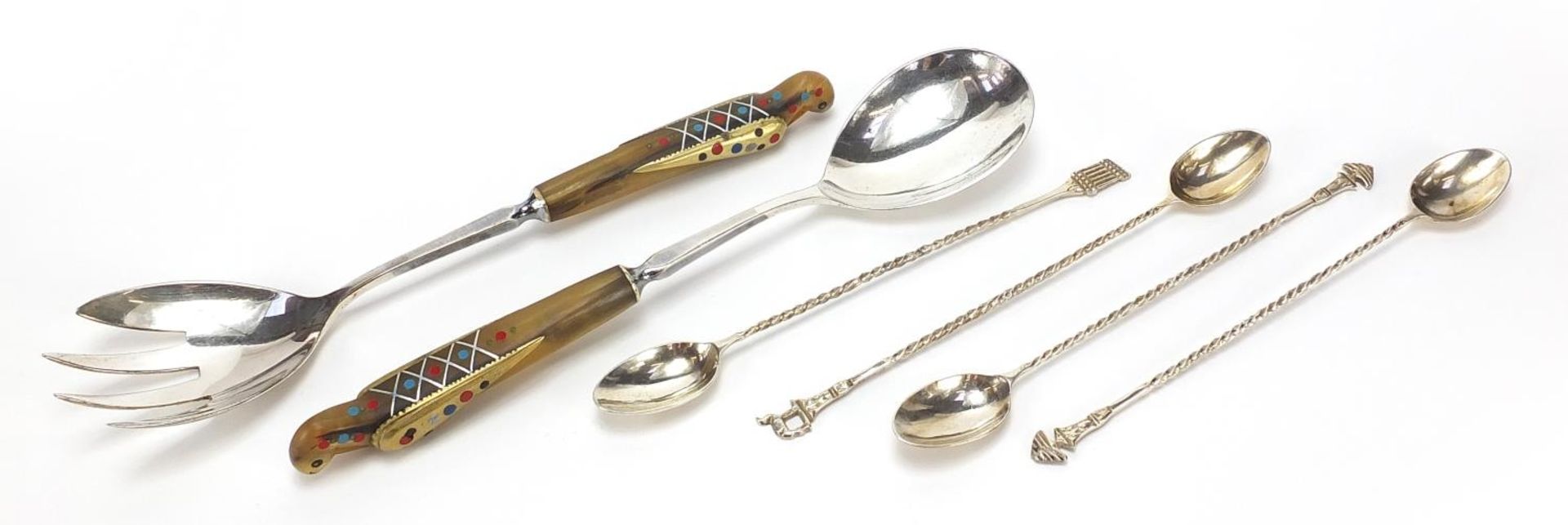 Set of four Indian silver spoons and pair of horn handled salad servers, the largest 23.5cm in