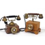 Two retro telephones including a copper example, the largest 25cm high