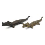 Two brass and cast iron nutcrackers in the form of crocodiles, the largest 39cm in length