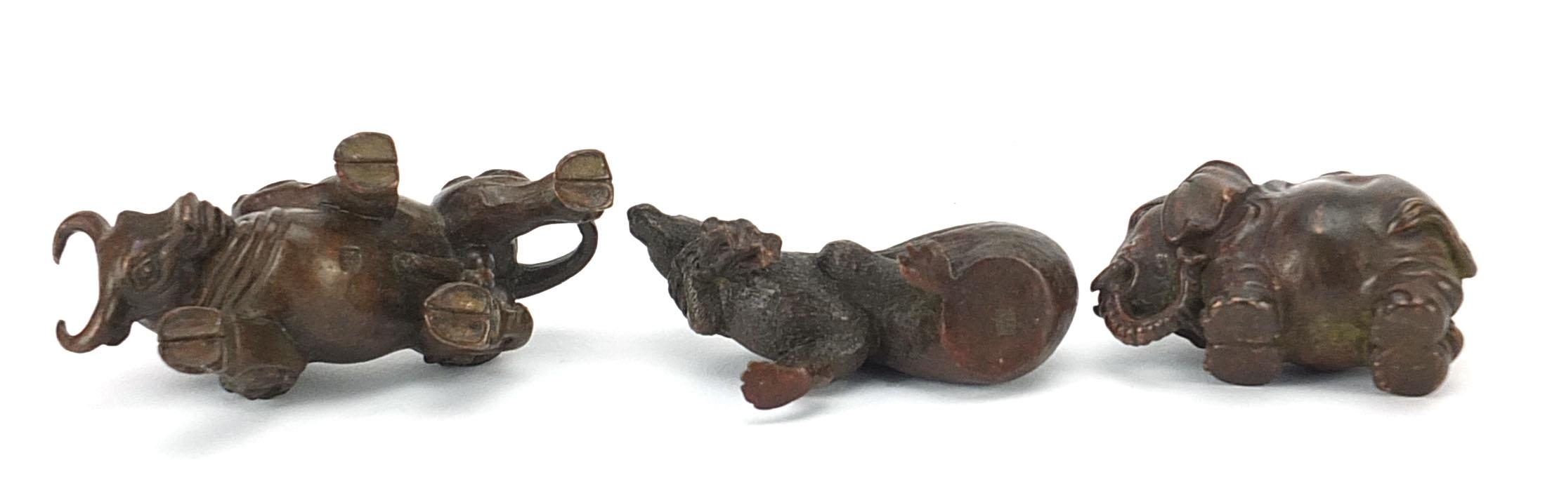 Three Japanese patinated bronze animals comprising bull, rat with a sack and elephant, each with - Image 7 of 10