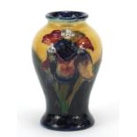 Moorcroft pottery baluster vase hand painted with flowers, 10.5cm high