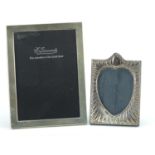 Two rectangular silver easel photo frames including one with embossed decoration, London 1998 and