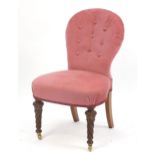 Victorian walnut framed bedroom chair with salmon button back upholstery, 83cm high