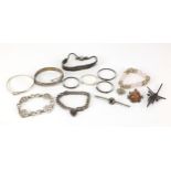 Silver jewellery including a Links of London silver and cord bracelet, christening bracelets,