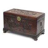 Chinese camphor wood trunk carved with warriors, 60.5cm H x 100cm W x 49.5cm D
