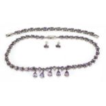 Silver amethyst and marcasite jewellery suite comprising necklace, bracelet and earrings, the