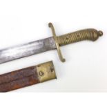 Military interest Prussian side arm with leather scabbard, stamp marks to the cross guard and