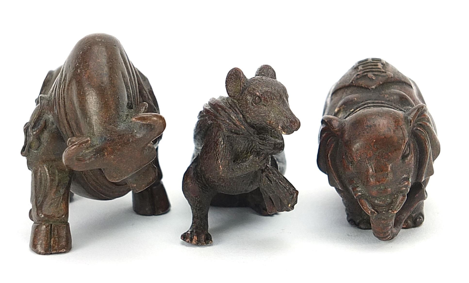 Three Japanese patinated bronze animals comprising bull, rat with a sack and elephant, each with - Image 5 of 10