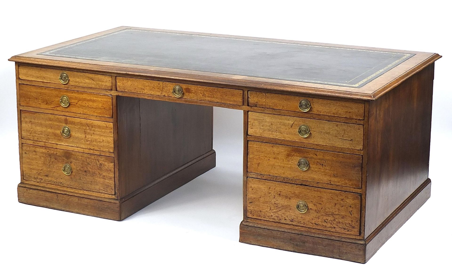 Large oak partner's desk with black leather insert above a series of drawers, reputedly Boris