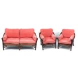 Three piece conservatory suite with pink upholstered cushions, the sofa 86cm H x 170cm W x 80cm D