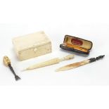 Antique objects including carved ivory box with hinged lid, bone umbrella 'Souvenir of Brighton'