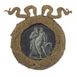 Antique circular enamel panel hand painted with a nude female, possibly Limoges, housed in a brass