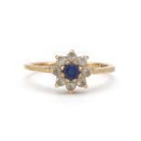 9ct gold blue and white sapphire flower head ring, size O/P, 2.4g