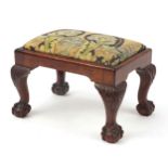 Carved mahogany stool with carved ball and claw feet and William Morris deign seat, 25cm high