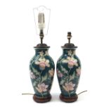 Pair of Chinese porcelain vase table lamps hand painted with flowers, each 53cm high