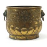 Large brass coal bucket with lion handles, 32cm high